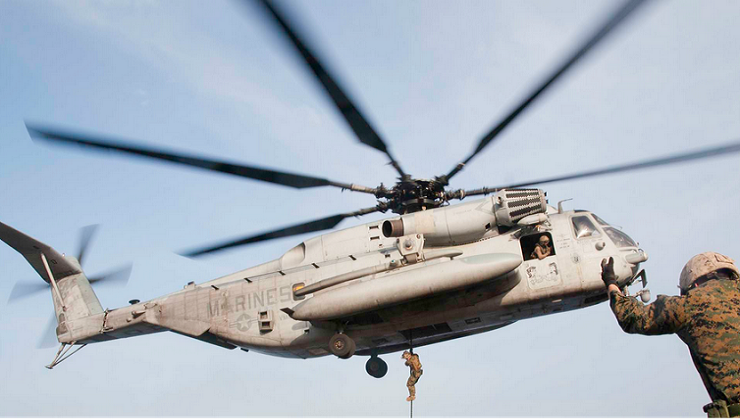 US Marines doing fast rope from CH-53E Super Stallion Helicopter
