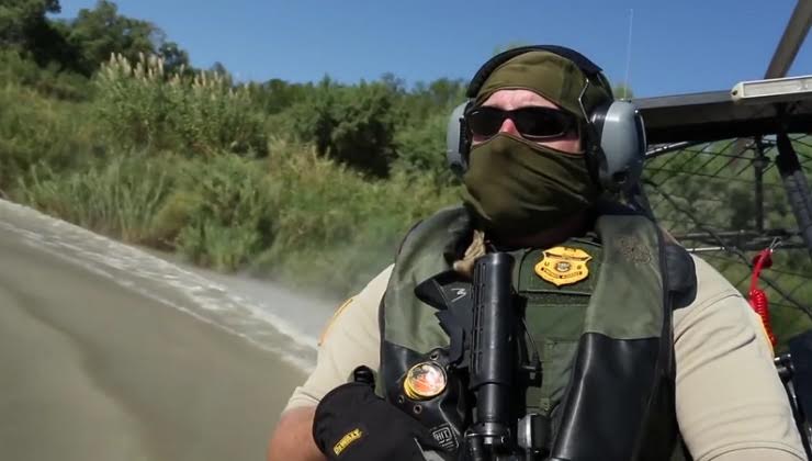 U.S CBP Men Patrolling inside a Supercharged Engine Airboat