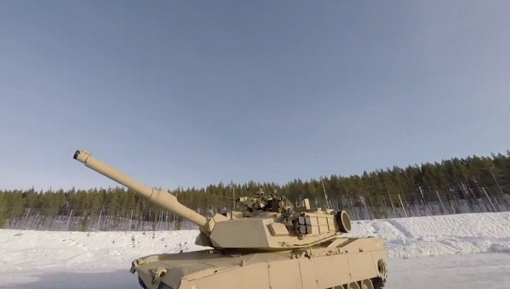 M1A1 Abrams and Leopard 2 Tanks in Action ( Video )