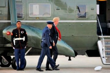 WATCH: Commander in Chief Trump Helps Marine With Hat on Windy Tarmac