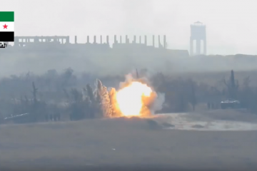 Watch a Syrian Army APC as its hit by an Anti Tank Missile ( Video )