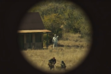 War Movie Scene: Man in the White Suite from the Siege of Jadotville