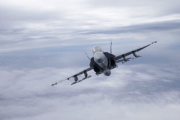 Refueling a F/A-18 Hornet with Marine Fighter Attack Squadron